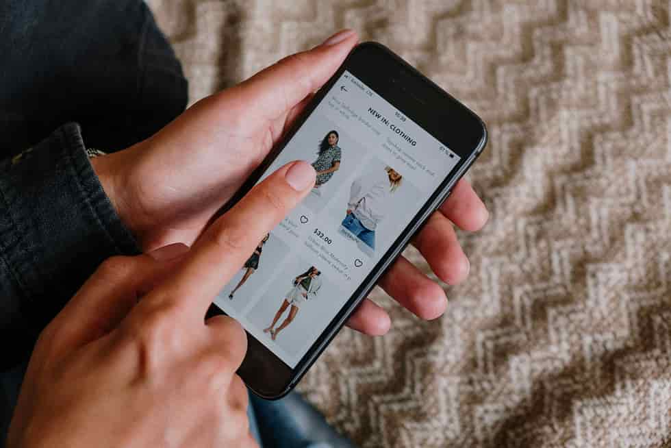 hands shopping on smartphone